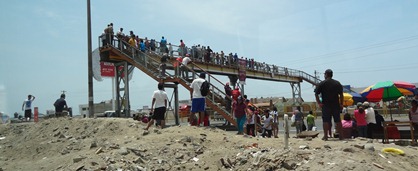 12 People waiting for road rally finish in Lima