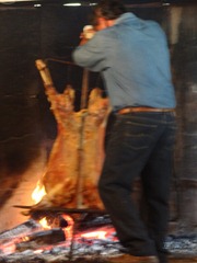 53 Turning the lamb on spit