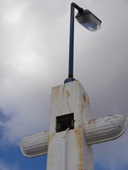 50 Streetlight on sore road (Ross Road West) with boat decoration