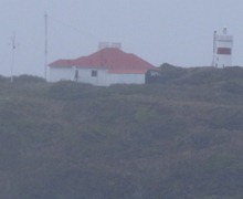 59 Lighthouse with house in Chilean fjords