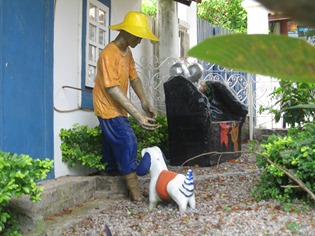 62 Sculpture of man with dog