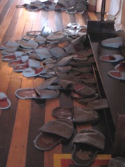 45 pile of slippers upstairs at Teatro