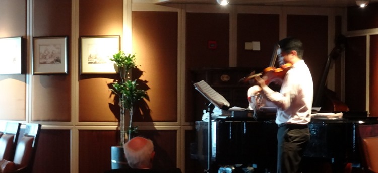 Adagio playing in the Explorers' Lounge